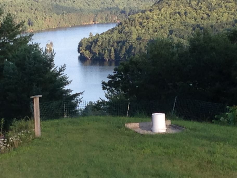 Horse shoe pit and view of Bryant Pond (lake)