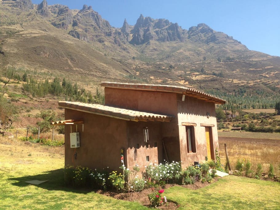 Beautiful Cabañita in La Pacha surrounded by mountains in the Sacred Valley.