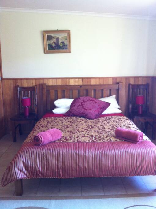 One of six bedrooms