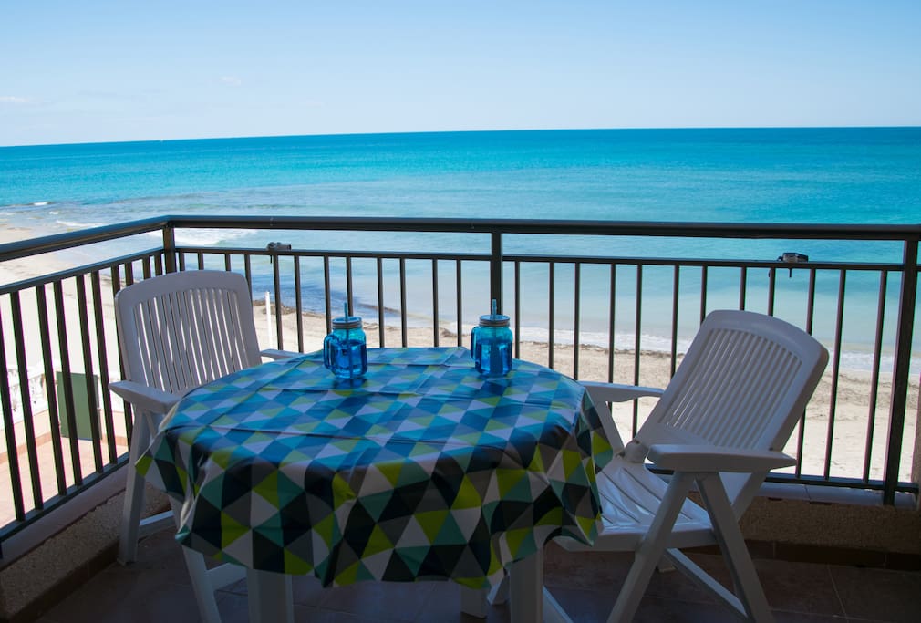 Balcony overlooking beach, shady in the afternoons.