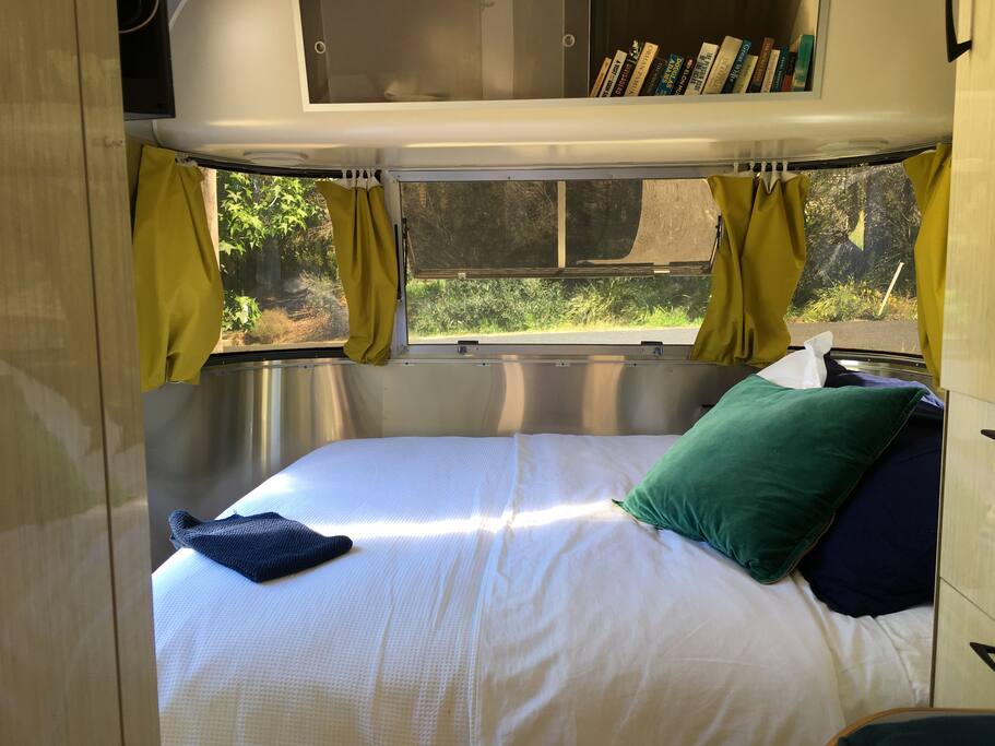 Very comfy queen size bed, tinted windows to the street and blackout blinds