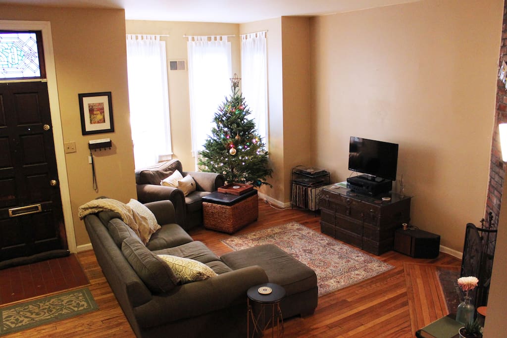 Cozy but spacious living room, with fireplace.