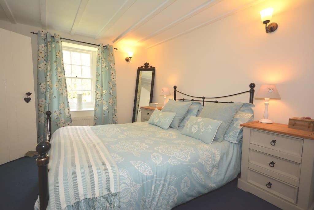 Ground floor double bedroom looking out to the front garden
