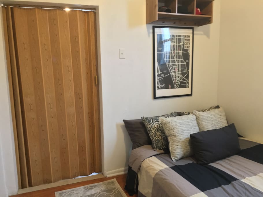 Your private room off the kitchen and bath area with a separate entrance from the host and beautiful hardwood floors.