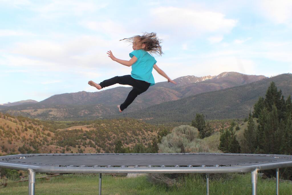 One kid having fun on the trampoline