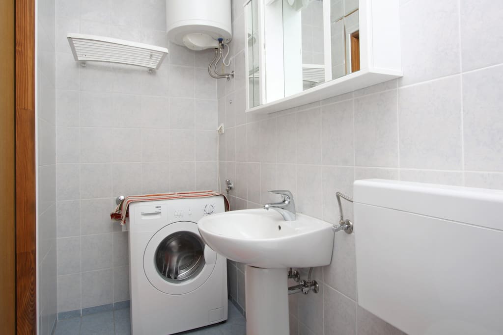 Bathroom with washing machine