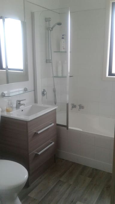 Shared bathroom with toilet
