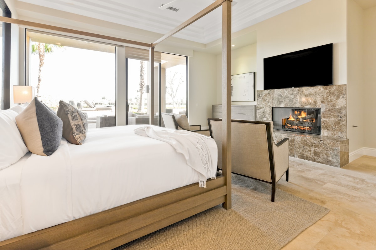 Master bedroom with beautiful views, fireplace and HDTV.