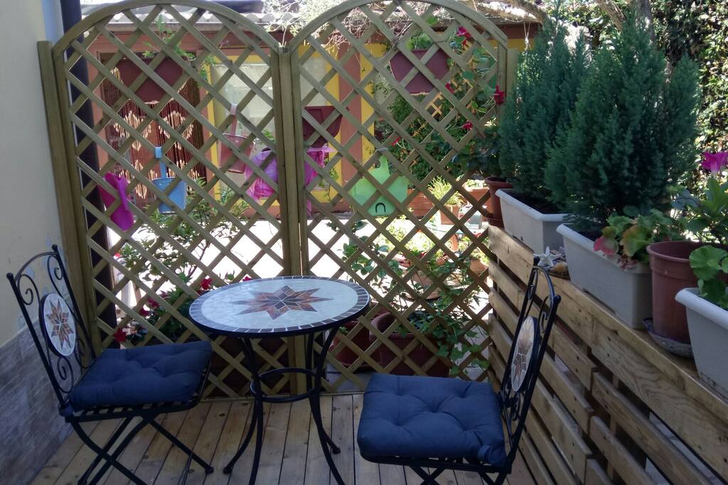 Cosy place at the veranda in front of the house