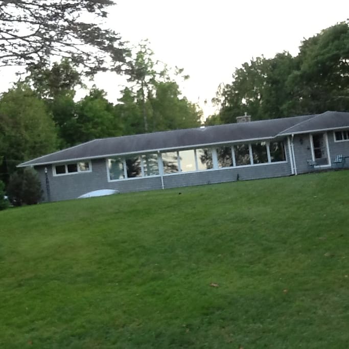 Big house with front view to the river and large gardens