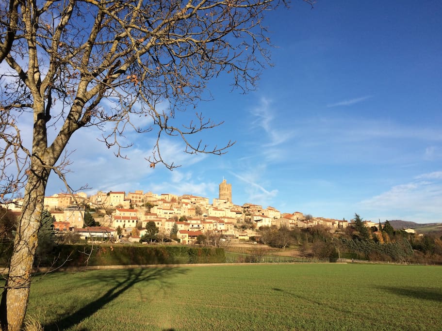 Restored Medieval village built of mellow okra limestone