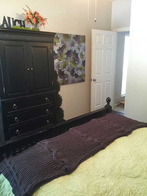 Armoire with 32in flat screen tv.