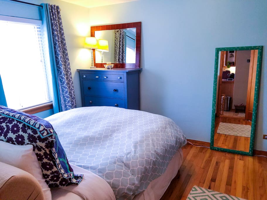 Quiet bedroom with queen size bed, high thread count cotton sheets, and down comforter for a good nights rest.