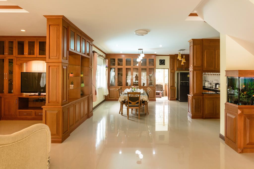 Hardwood cabinets throughout the living and kitchen areas
