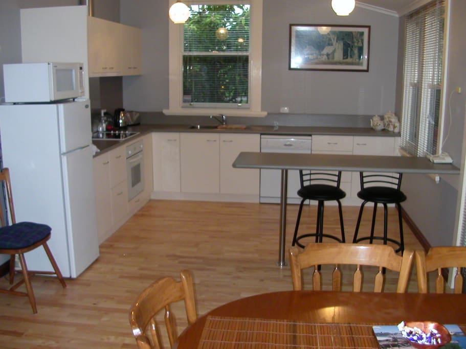 Kitchen dining room, fully equipped, full size fridge, oven + microwave, dishwasher and all cooking utensils - just bring BYO food! Free starter kit of Tea, coffee, sugar, milk
