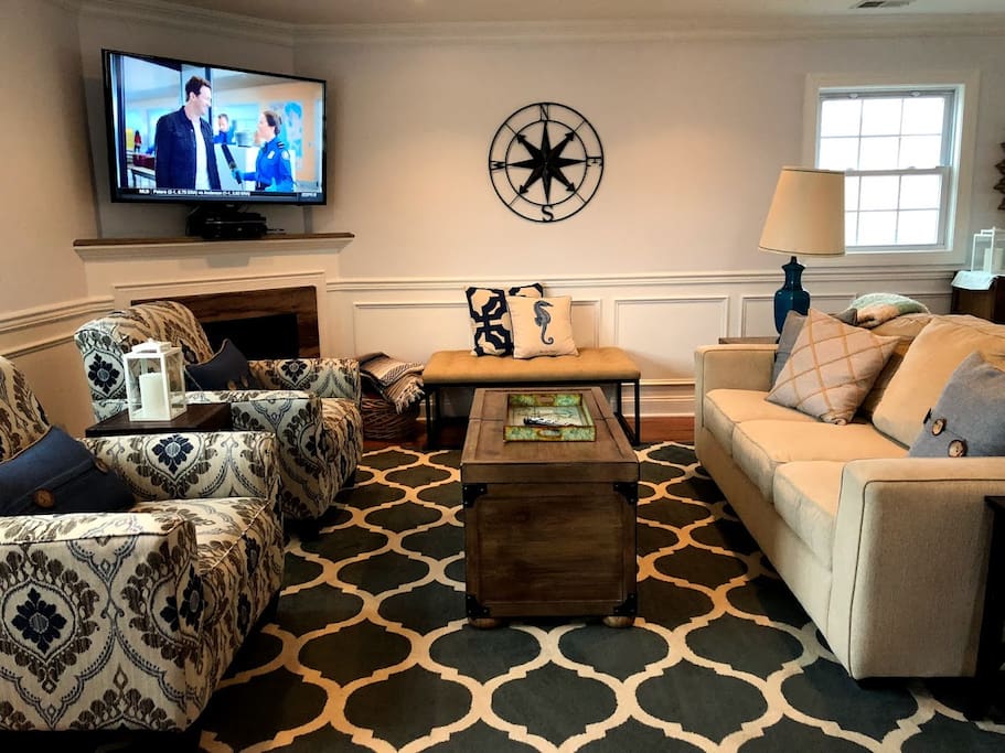 Bright, spacious main living room, equipped with large flat-screen SMART TV