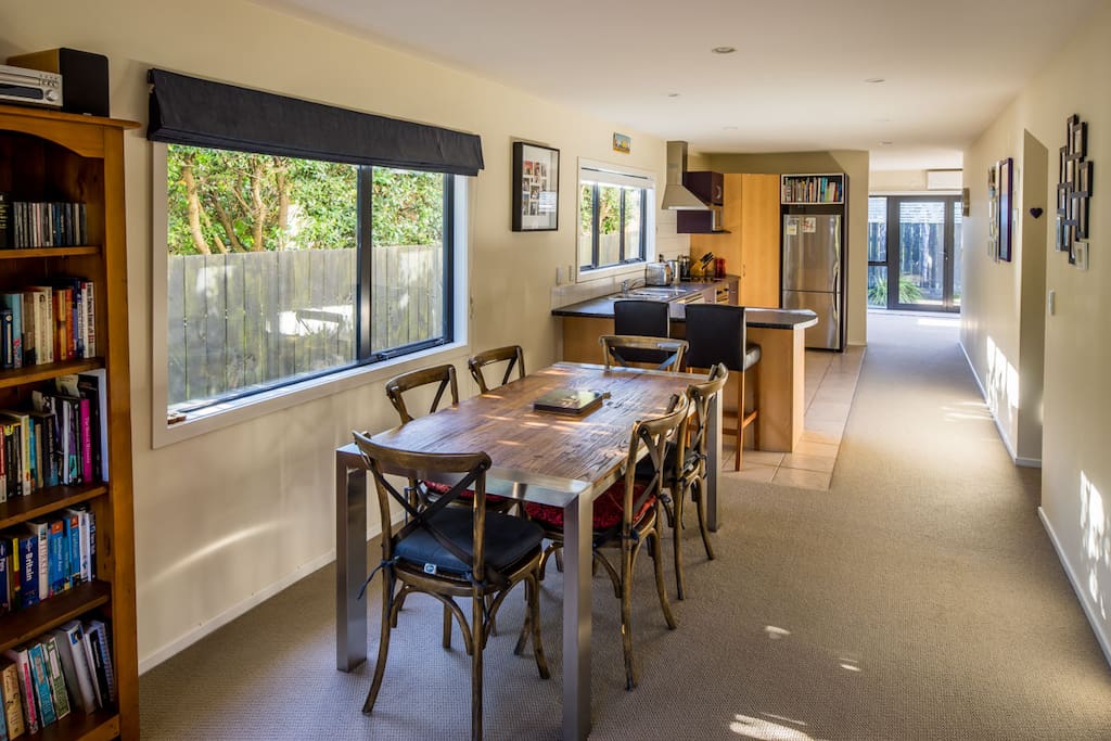 Sunny, spacious modern home only 1 minute walk to the beach