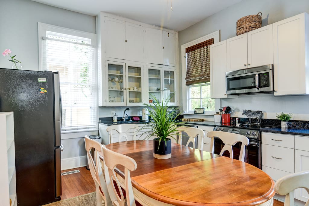 Fully equipped kitchen that looks onto the massive back yard!