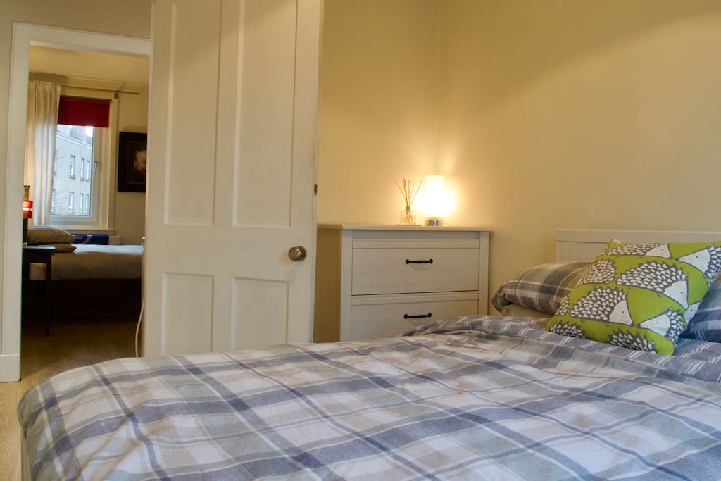 Bedroom 2 with storage and a double bed