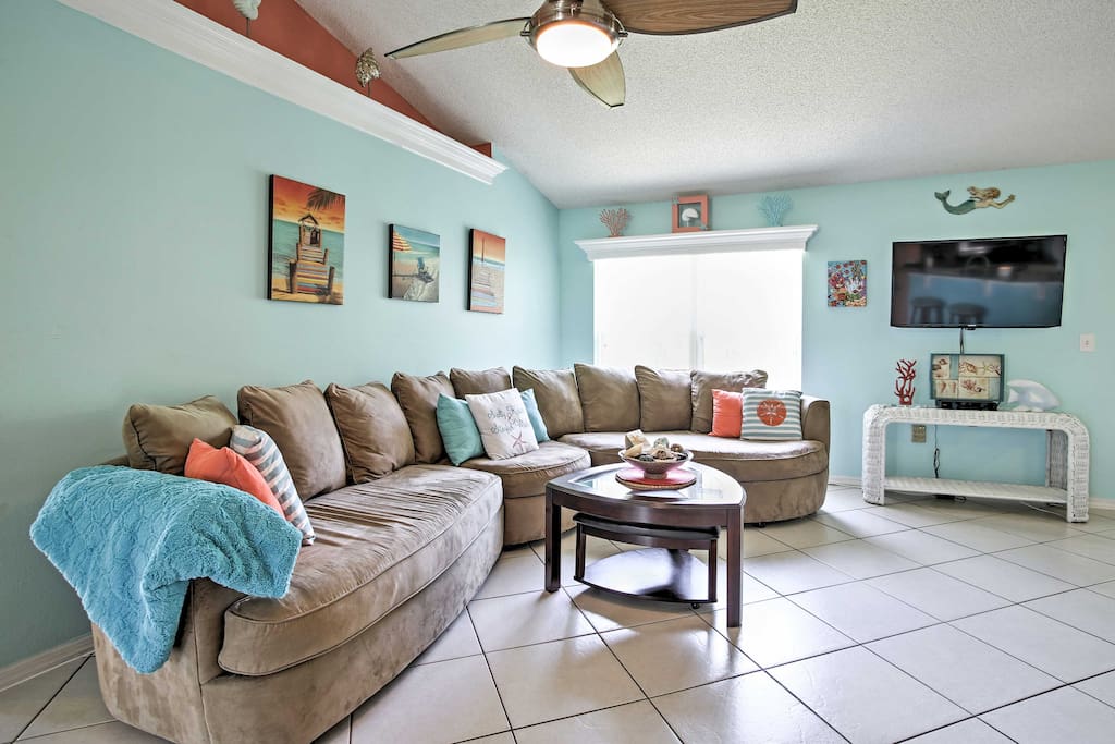 The vibrant and spacious, 2,500-square-foot interior sleeps 10 in 4 bedrooms.