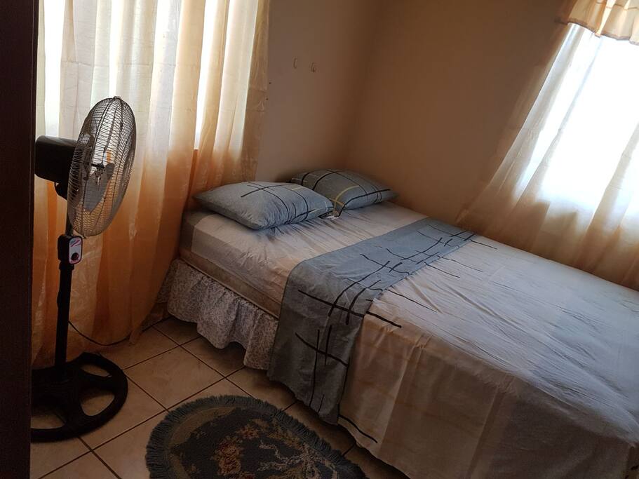One of the bedrooms in the apt
