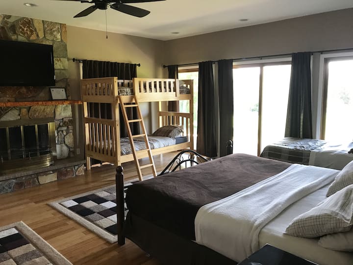 First floor Master Bedroom with King size bed.