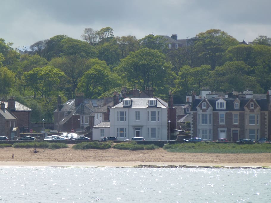 Ground floor apartment of Chelmsford House clearly shown from the sea (white building)