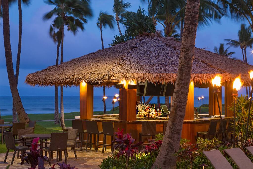 Pau Huaka’i (pronounced “pow hoo-ah-ka-ee”) tiki bar is the perfect place to end your day’s adventures.