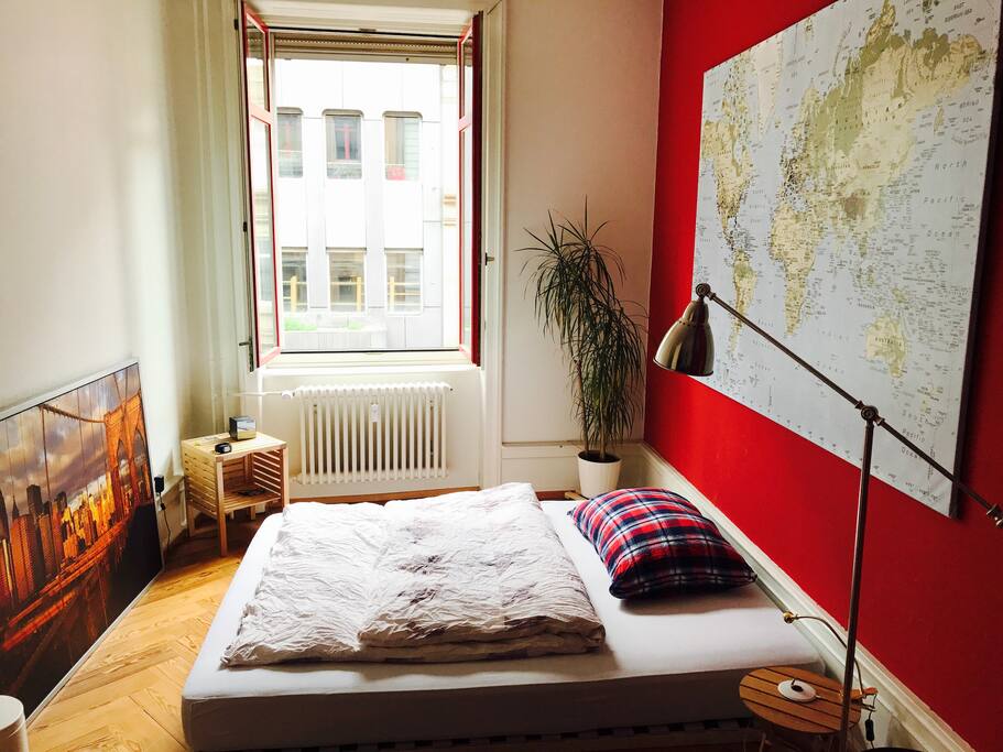 Master bedroom - cozy bed, inviting you to dream about past and future travels.