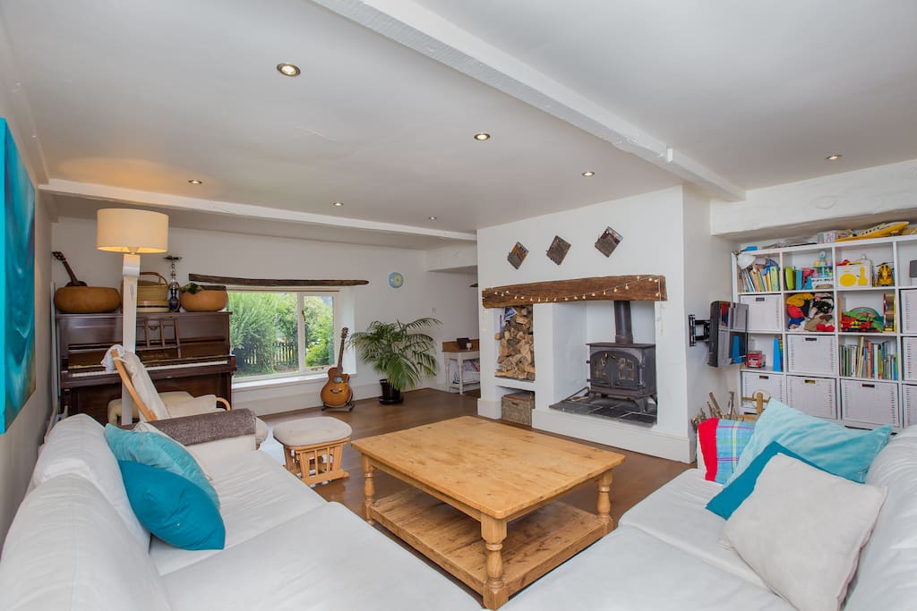 Spacious living area with log burning stove