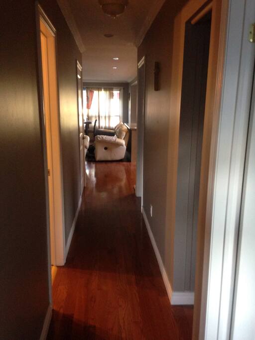 Hallway going to master bathroom, first door to the right. Straight ahead is the bedroom.