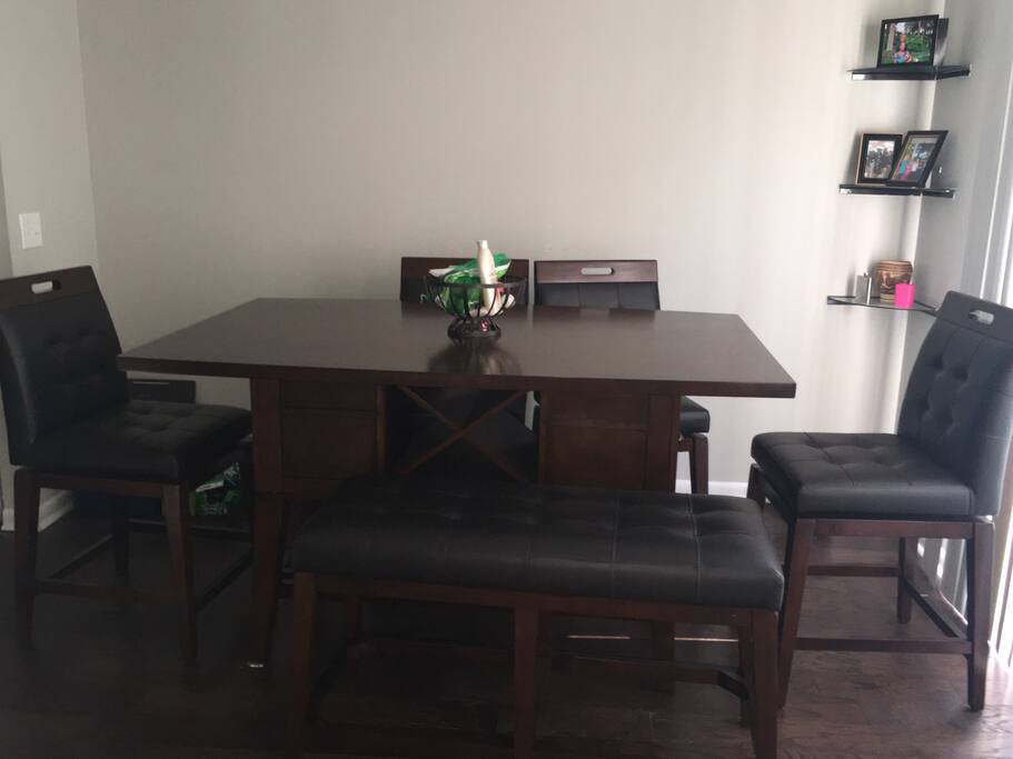 Separate dining area overlooking patio and backyard
