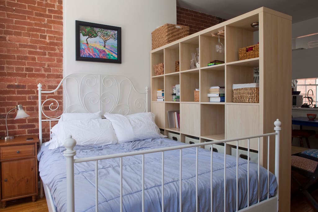 Full size bed with memory foam mattress pad and pillows. Bedding is changed between guests and therefore may vary slightly from photo shown, but is always comfy.