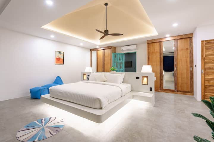 Enjoy large bedroom with ceiling fan and aircon for all your needs
