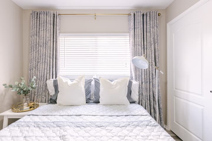 Bedroom one has a queen size bed with a cloffice. 