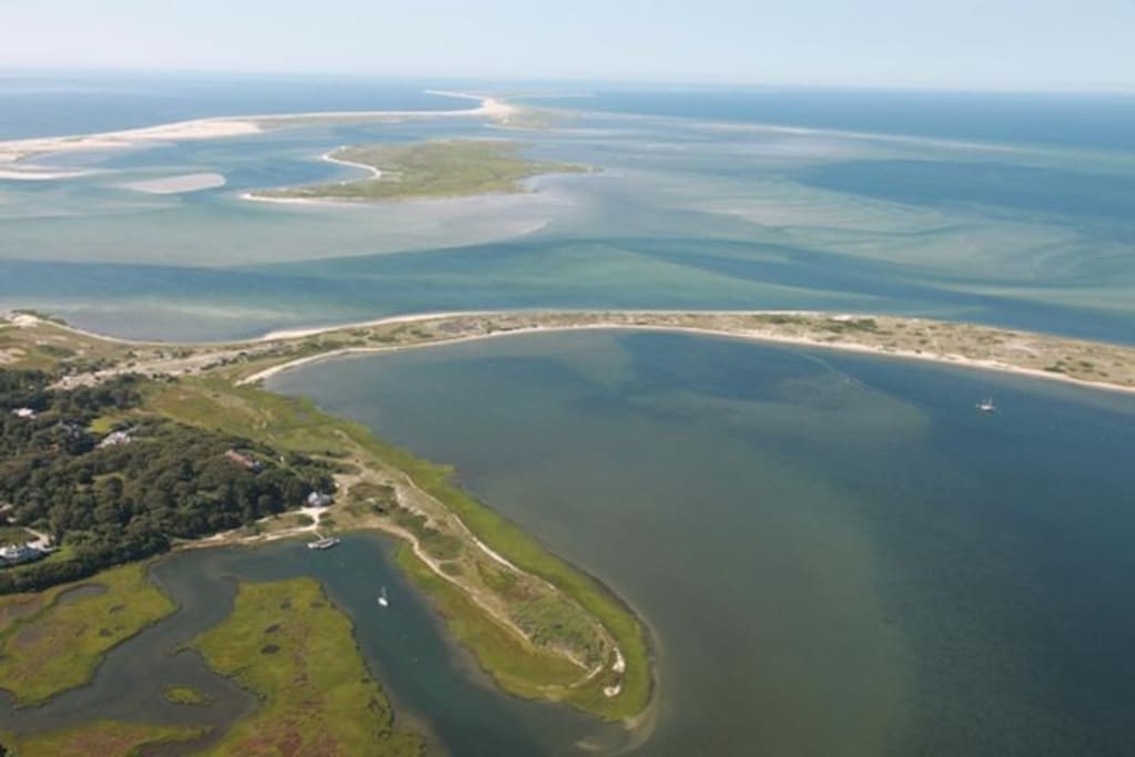 aerial view of the cove and Nantucket Sound where the property is located.House sits on the far left corner of cove.