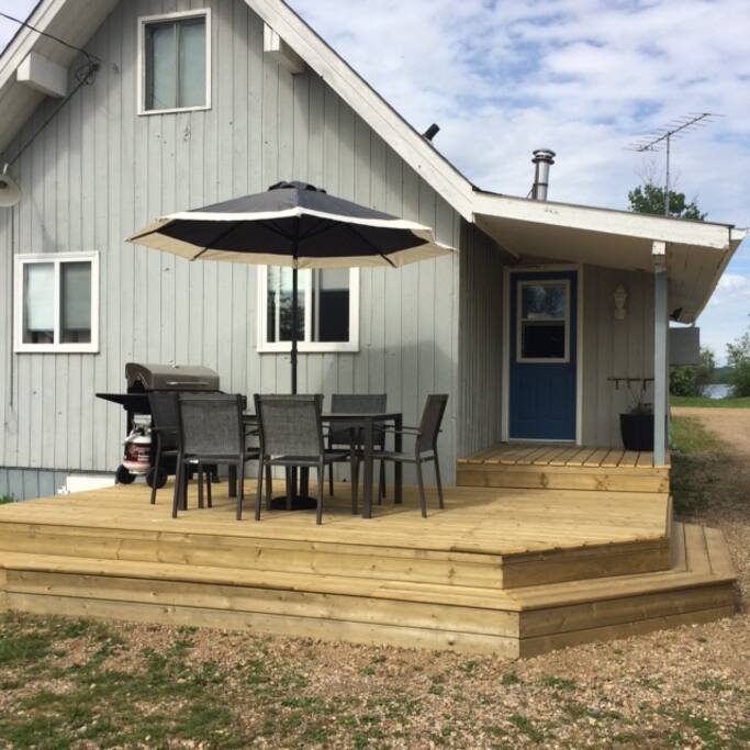 Back deck of the cabin. BBQ and patio area.