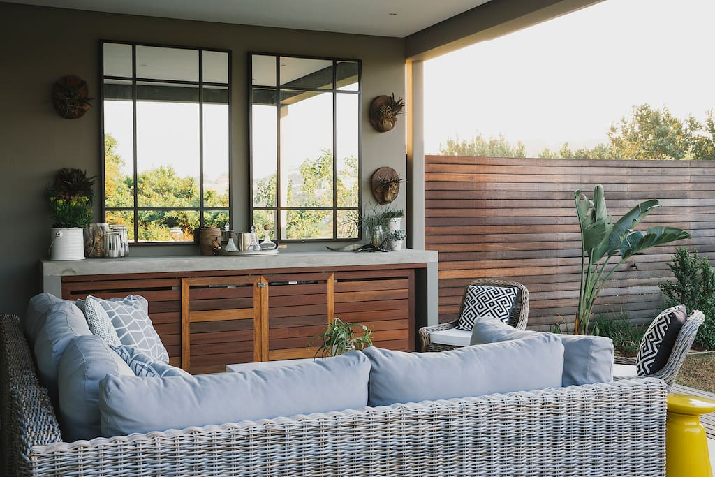 Patio entertainment area with double drinks fridge, freestanding Weber and gas braai/barbecue