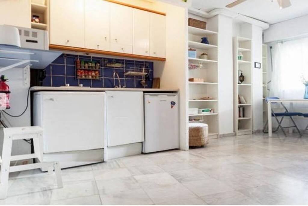 Kitchen with all the basic stuff to cook home made dishes.