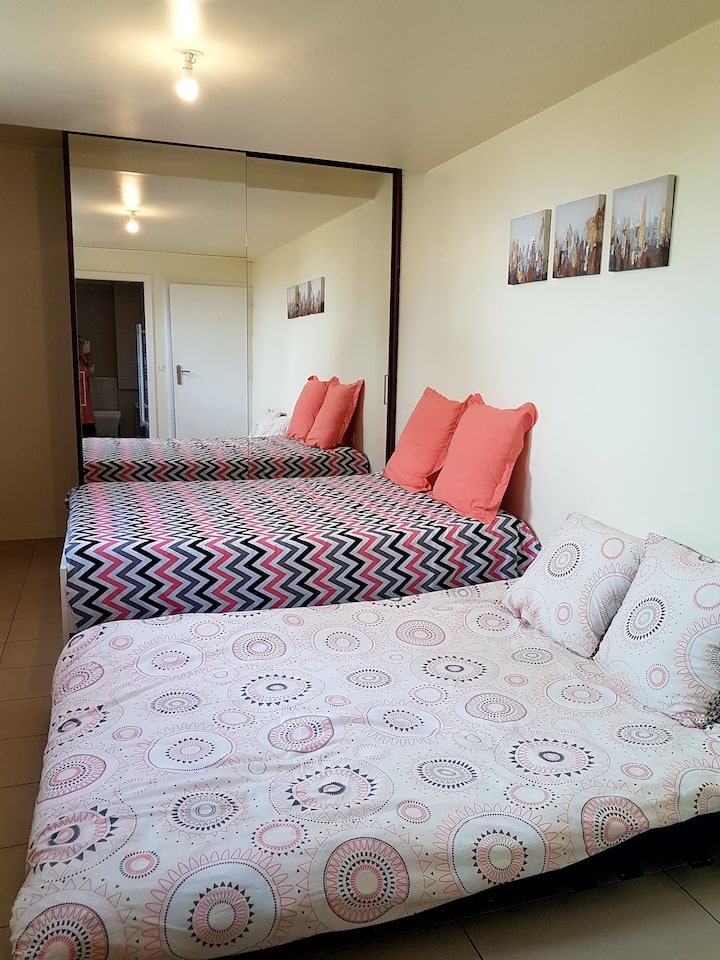 Bedroom 4  with two double beds and en suite toilet and shower.