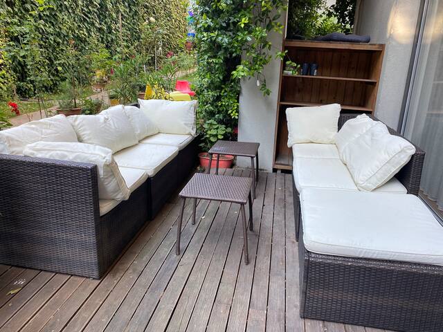 Spacious apartment with garden and swimming pool