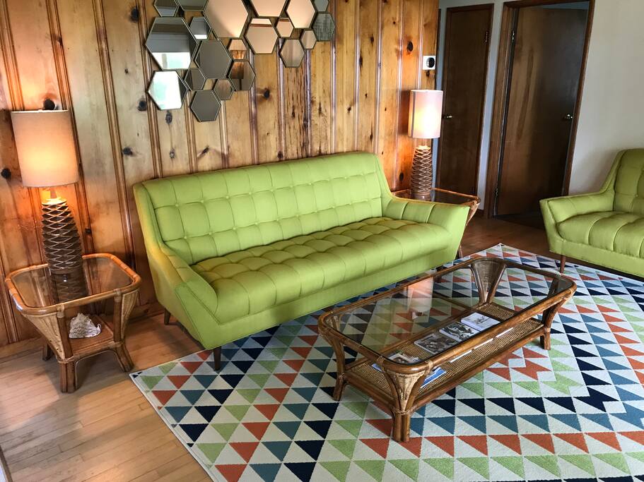 Living room opens to screened porch.