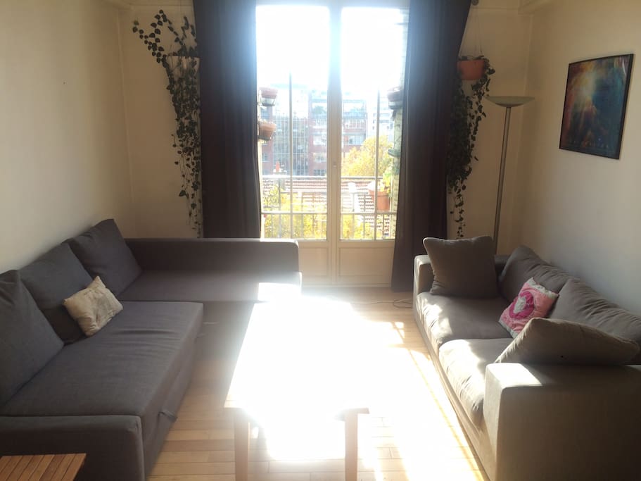 Spacious Living room with couch and double couch bed- Double vitrine with balcony facing the sun