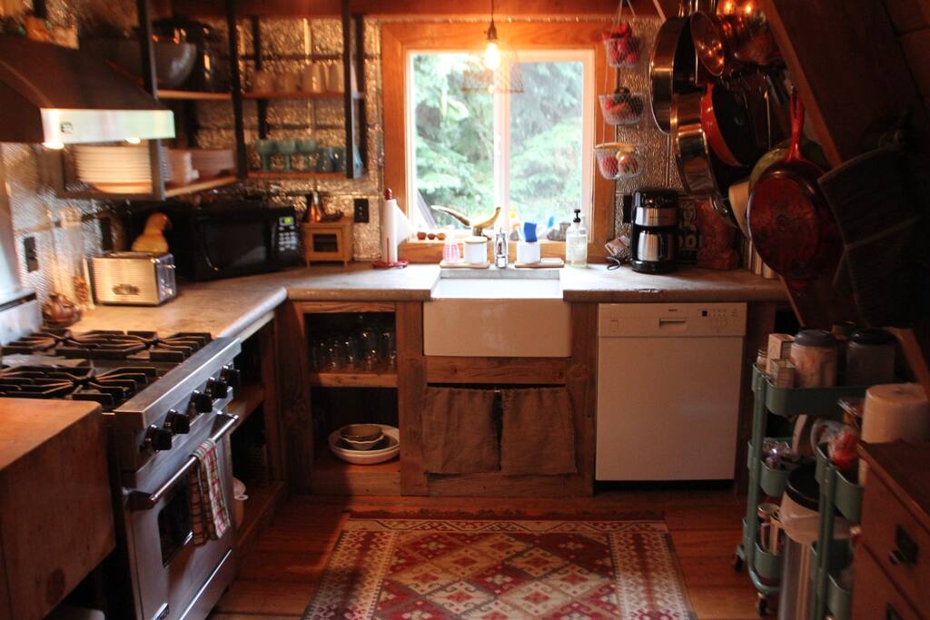 Gourmet kitchen complete with Viking stove, concrete counters, coffee maker, lovely dishes, gourmet pots and pans, sharp knives, herbs, spices, oils and most everything you'd need to cook with. Just ask if you have any questions!