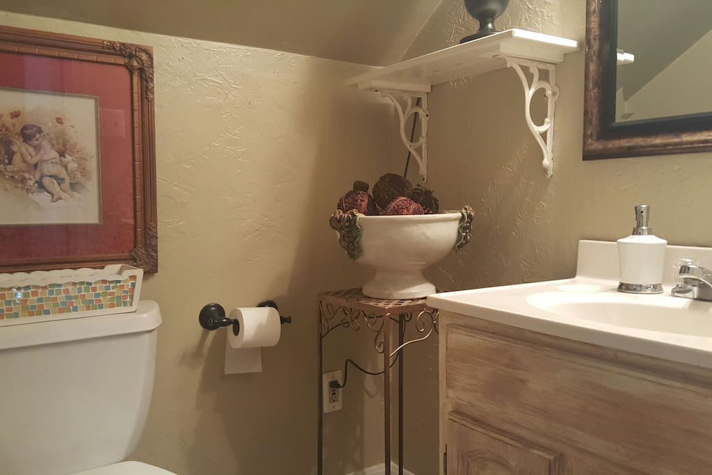 Private powder room. Shower downstairs