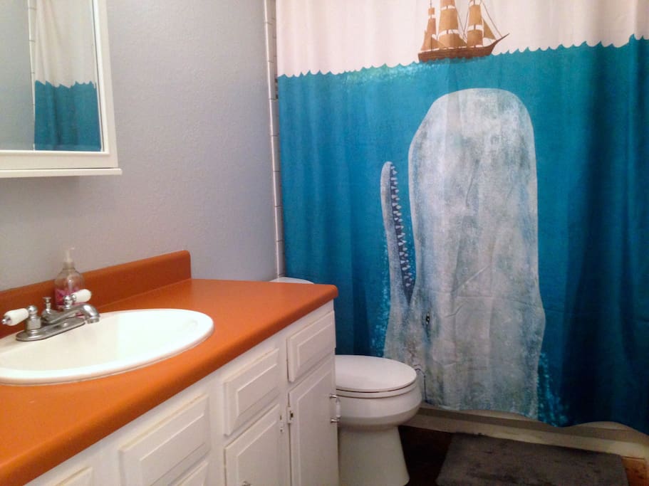 Bathroom with shower and tub.