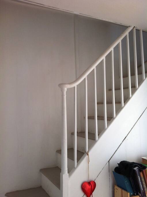 The stairs leading up to the attic room