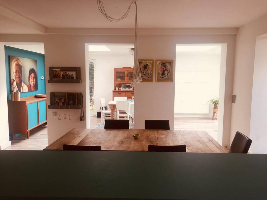 View from kitchen on dining room and second living room