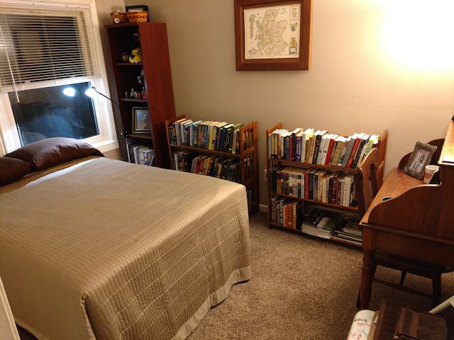 One cozy bedroom in townhouse.