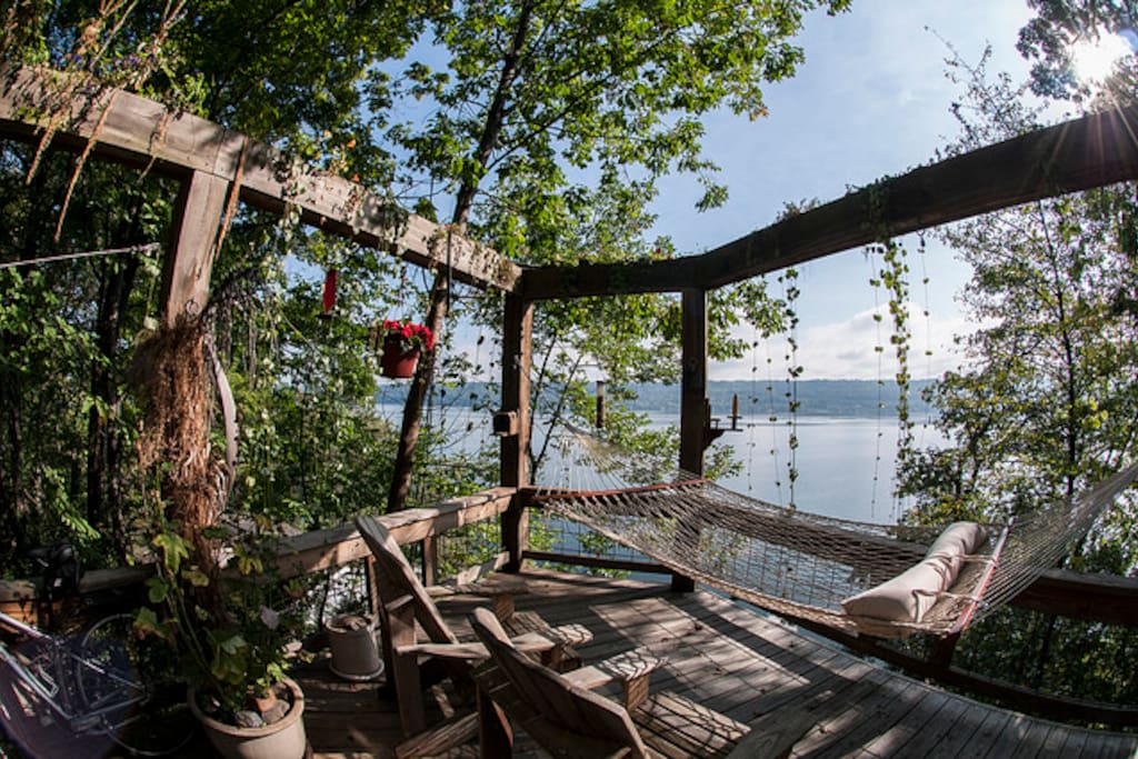 Private deck with hammock, lounge chairs, and beautiful vines and flowers in the warmer months. Watch the animal life come to you as we will give you food to place inside the feeders to watch eclectic birds (woodpeckers, blue jays, etc.) & chipmunks & squirrels + their young.